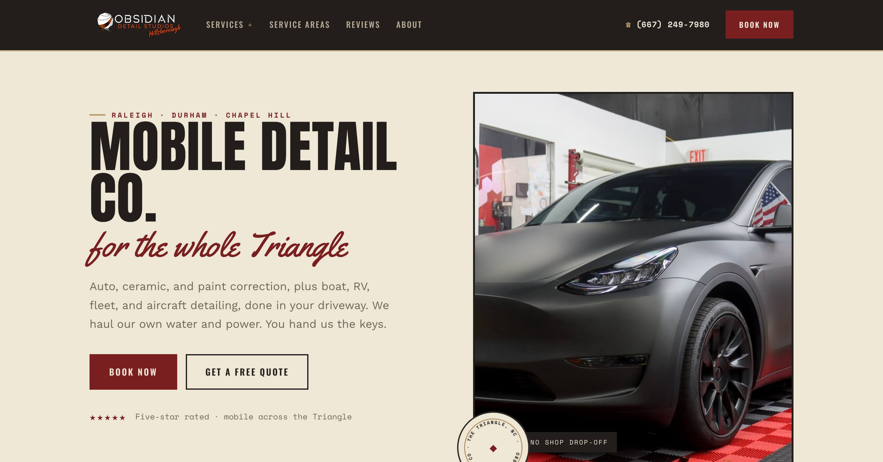 RUSTIC design system — cream paper, oxblood, and brass heritage garage look